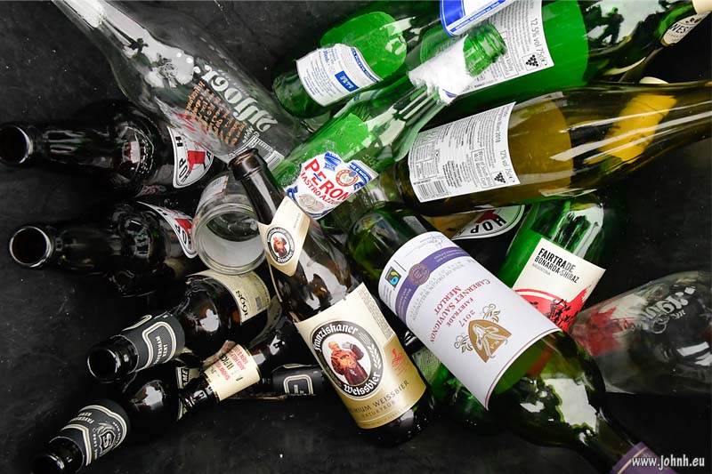Christmas party bottles in the recycling bin