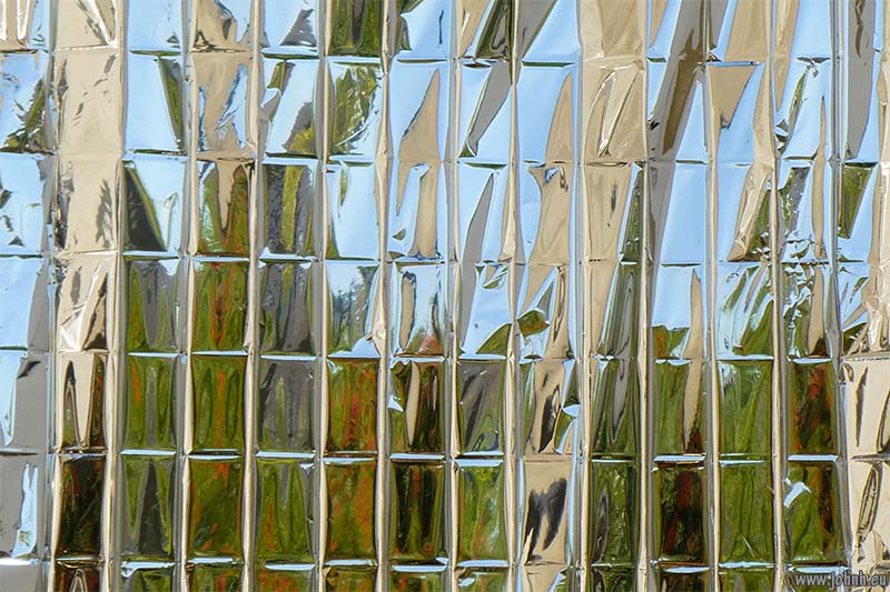 Images made with solar film keeping heat out of windows.